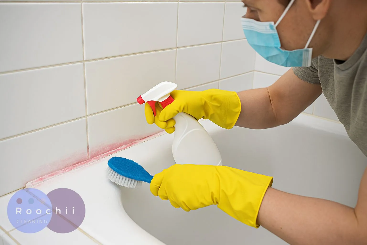 How to Clean Mold: A Comprehensive Guide to Mold Cleaning Methods 10 How to clean mold around the bathtub – removing pink mold with spray cleaner and brush.
